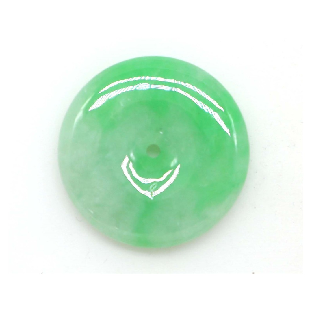 Round pale green jadeite piece photographed for certificate record GJ2306006992